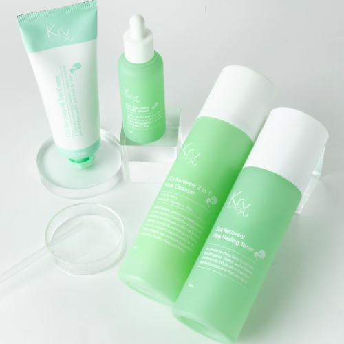 Set of krx cica recovery skincare products with green and white packaging on a light background sold at heaven on earth aspen