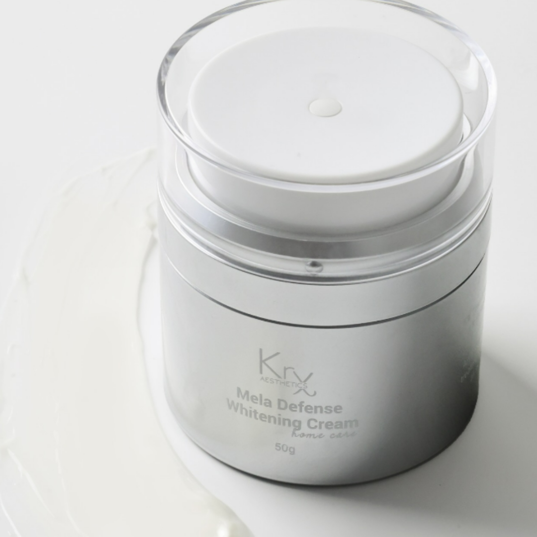 beautiful jar of the krx mela-defense-whitening-cream with a swatch of cream next to it old at heaven on earth aspen 
