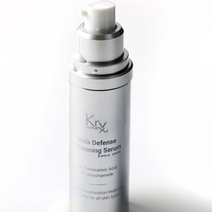 bottle of the KrX Mela Defense Whitening Serum with serum dripping off its spout sold at heaven on earth aspen