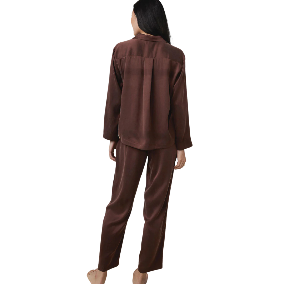 backside of a model wearing the Lunya Washable Silk Long Sleeve Pant Set sold at heaven on earth 