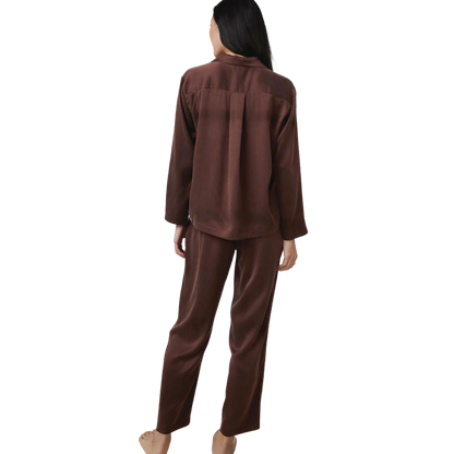 backside of a model wearing the Lunya Washable Silk Long Sleeve Pant Set sold at heaven on earth 