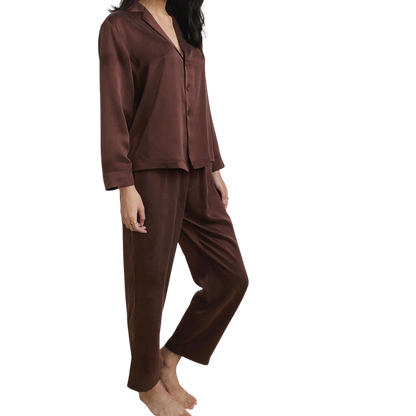model wearing the lunya washable silk long pant set in the beautiful dozing umber at heaven on earth 
