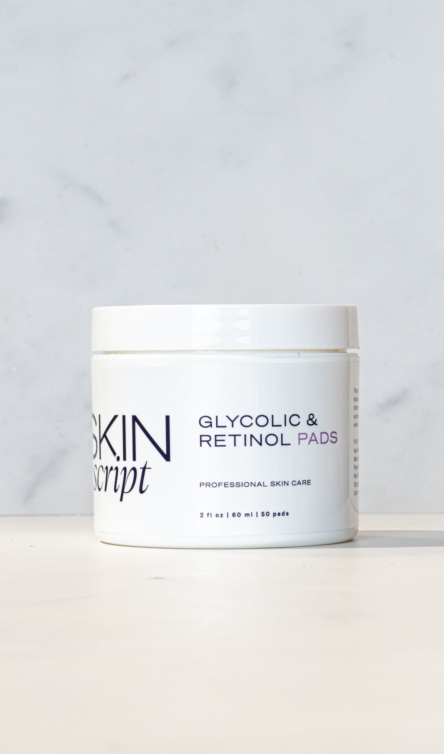 Jar of Skin Script Glycolic & Retinol Pads on a light gray background at the online store heaven on earth aspen