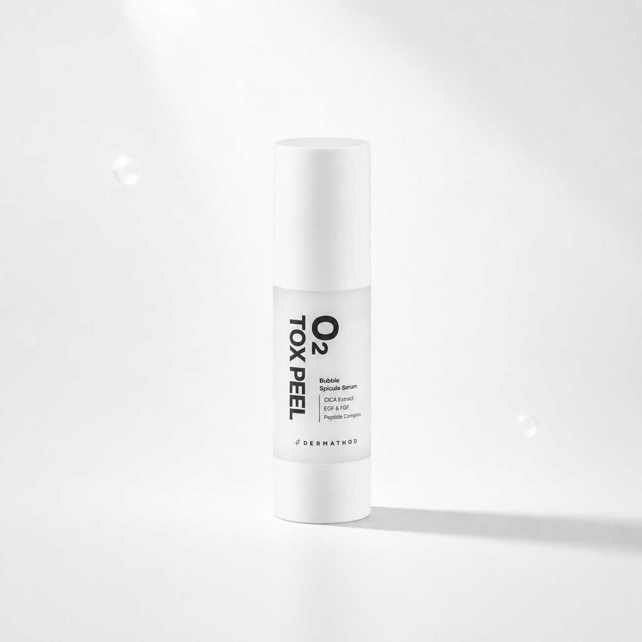 A white cylindrical bottle of Dermathod O2 Tox Peel Bubble Serum, featuring a minimalist white label with black text, set against a clean white background with soft shadows and floating bubble graphics.