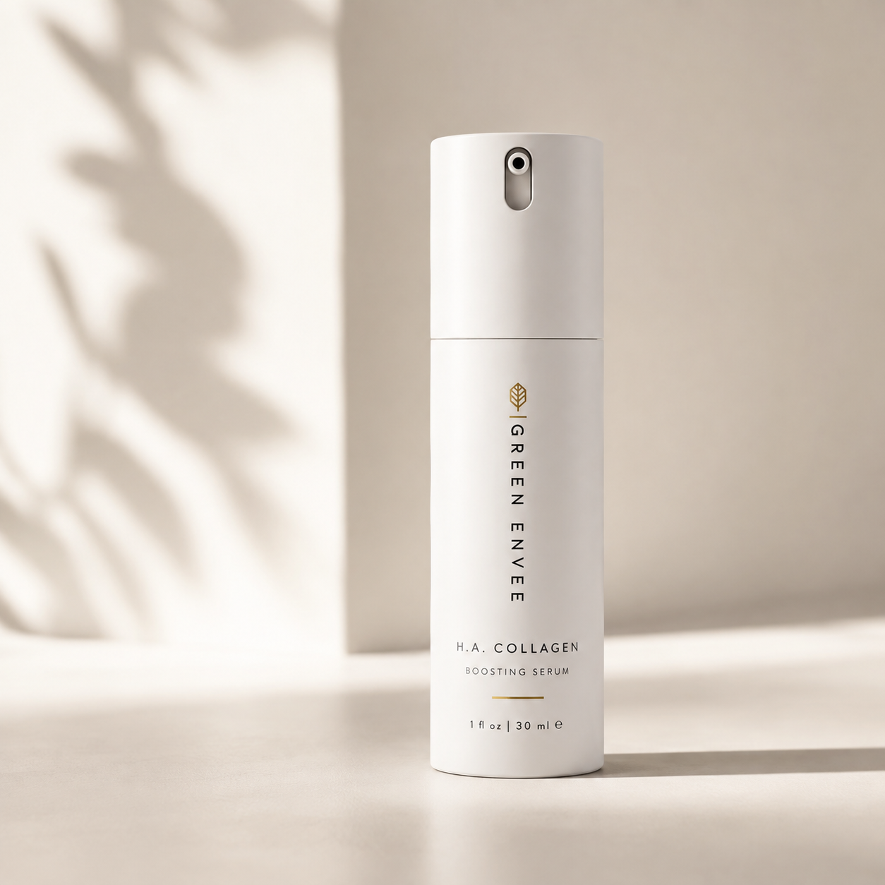 A 30 ml white bottle of Green Enve H.A. with beautiful shadows on wall 
