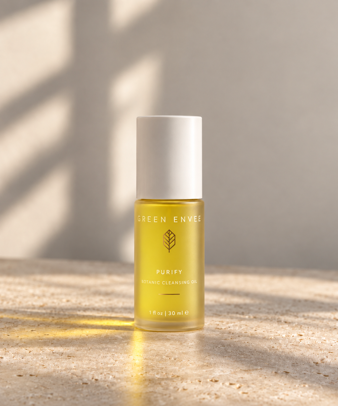bottle of the green envee botanic cleansing oil - mini 