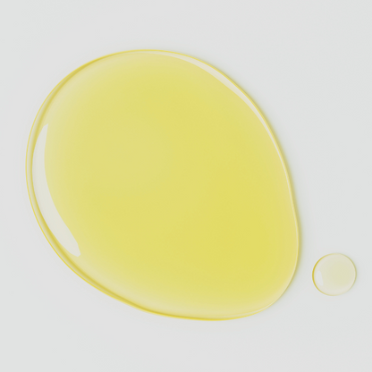 a drop  of the  green envee Vahati Herb Infused Healing Oil  at heaven on earth