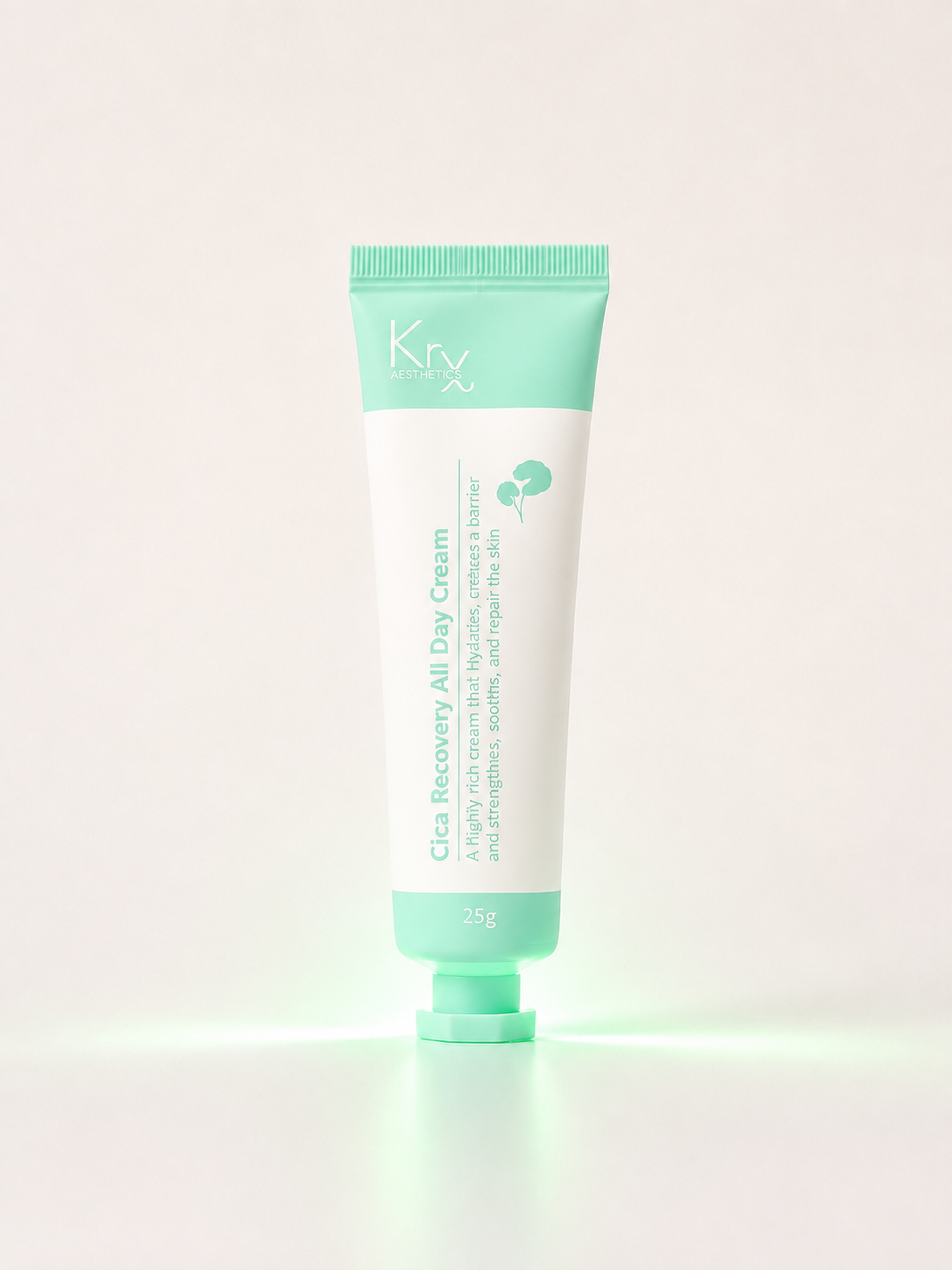 A squeeze tube of Krx Cica Recovery All Day Cream, featuring a mint green and white color scheme, set against a clean, off-white background with a soft green glow at the base.