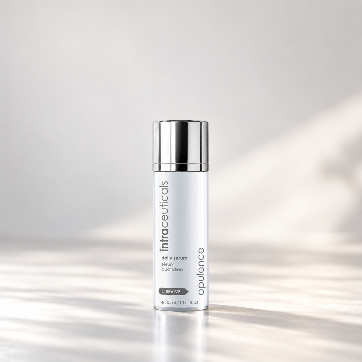 Intraceuticals Opulence Daily Serum displayed in soft natural light, formulated to improve the appearance of firmness and uneven skin tone.



