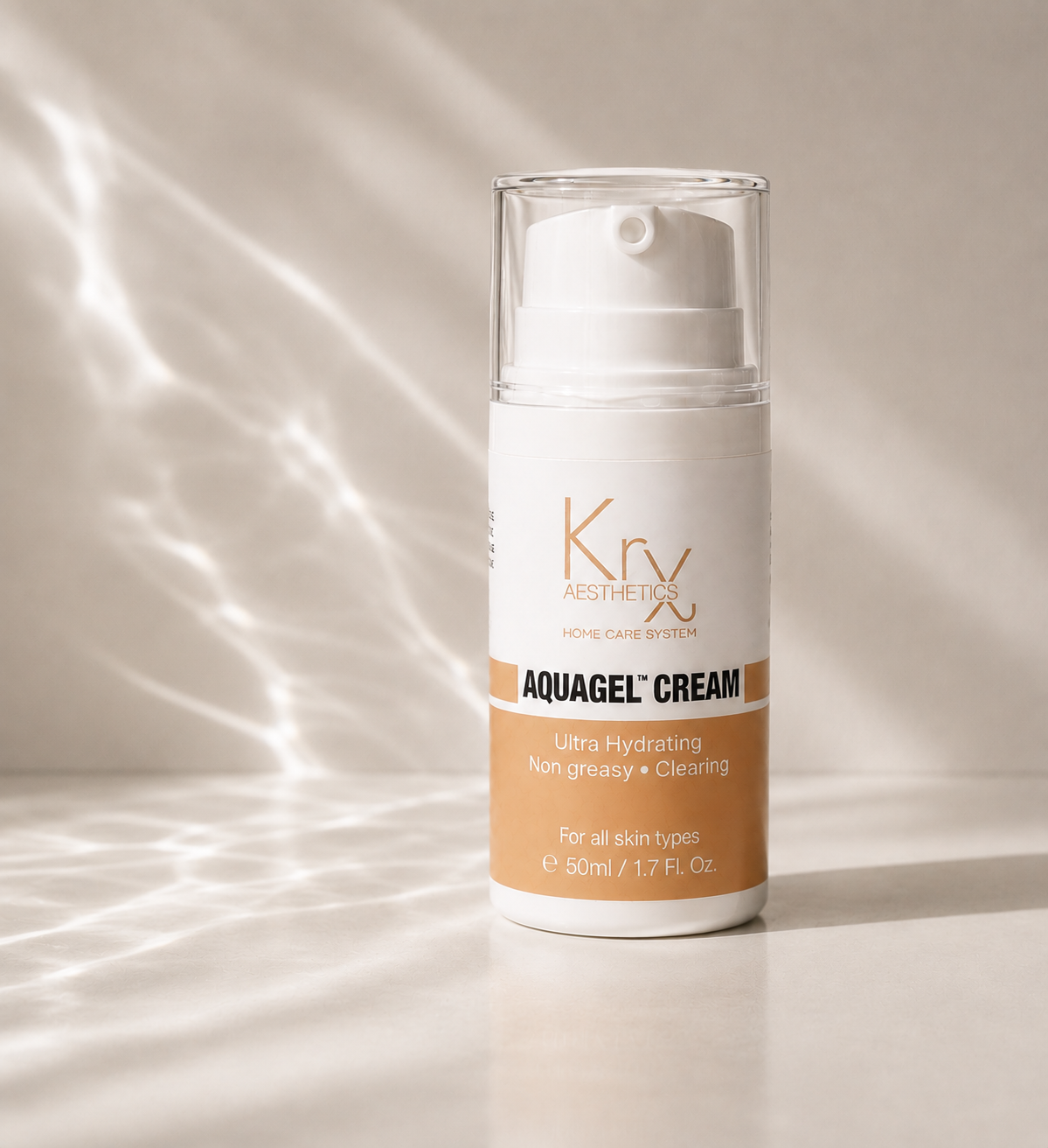 A pump bottle of Krx Aquagel Cream, featuring a white and peach-colored label with gold branding, set against a warm beige background with diagonal water light streaks.
