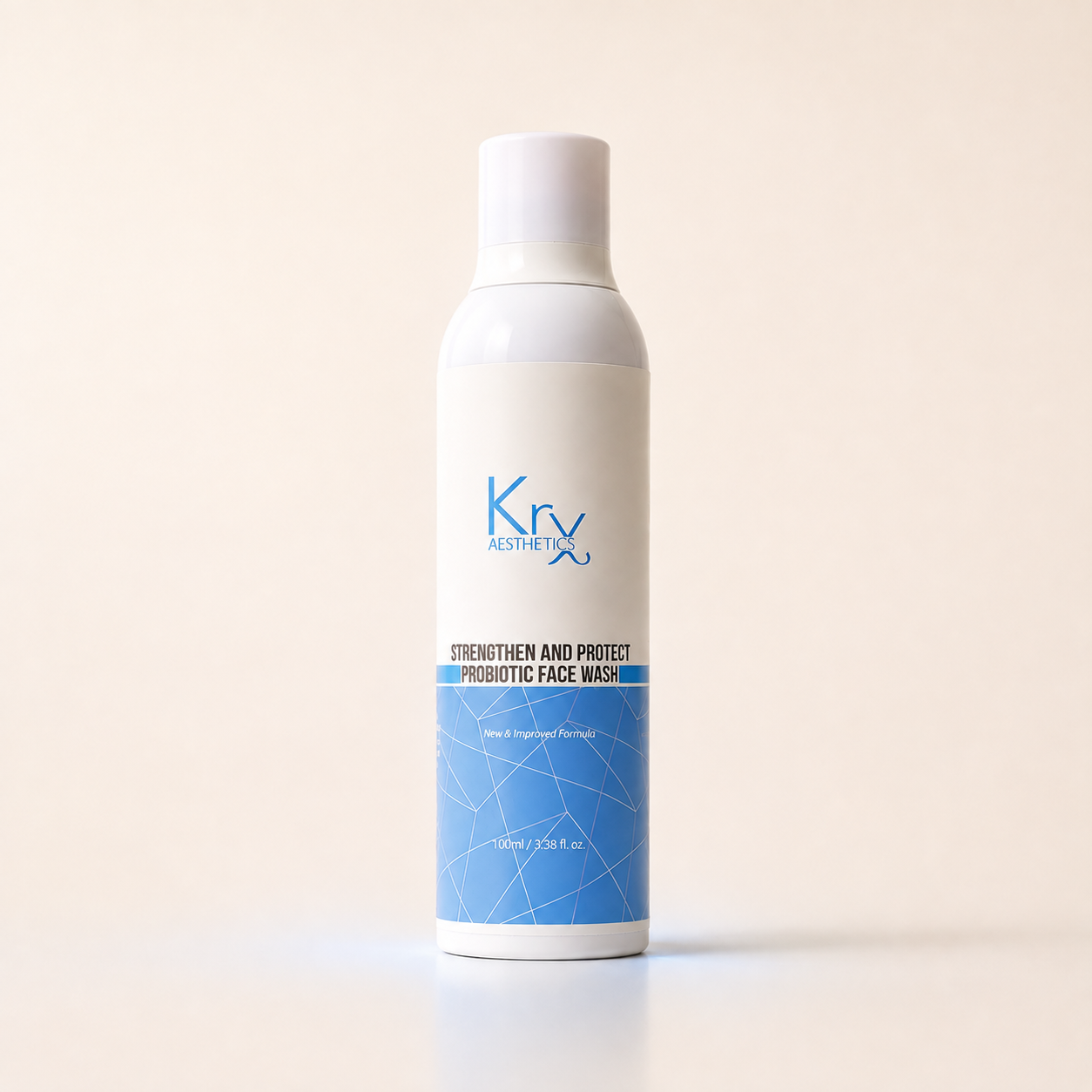 A white cylindrical bottle of Krx Strengthen and Protect Probiotic Face Wash with blue accents, standing on a light beige background.