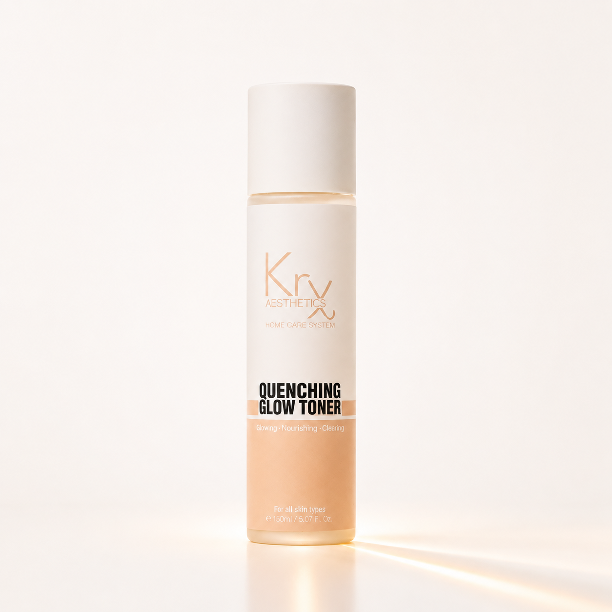 A bottle of Krx Aesthetics Quenching Glow Toner, featuring a white cap and a label with a warm peach-to-white gradient, set against a clean white background with a soft light reflection.