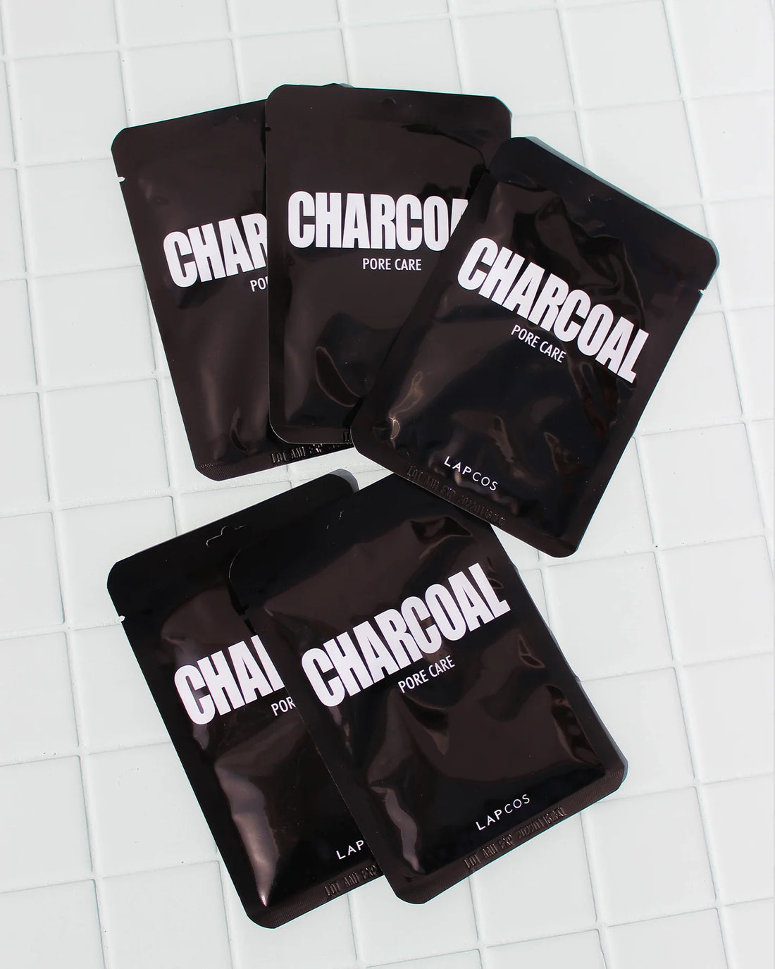 the 5-pack lapcos charcoal sheet mask sold at heven on earth