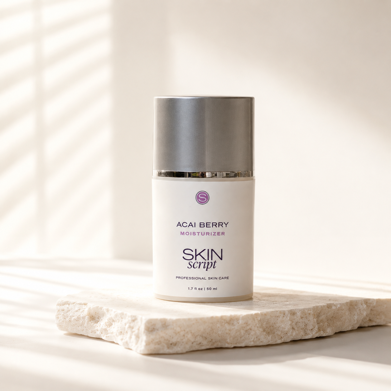 a white bottle with acai berry moisturizer skin script on It
