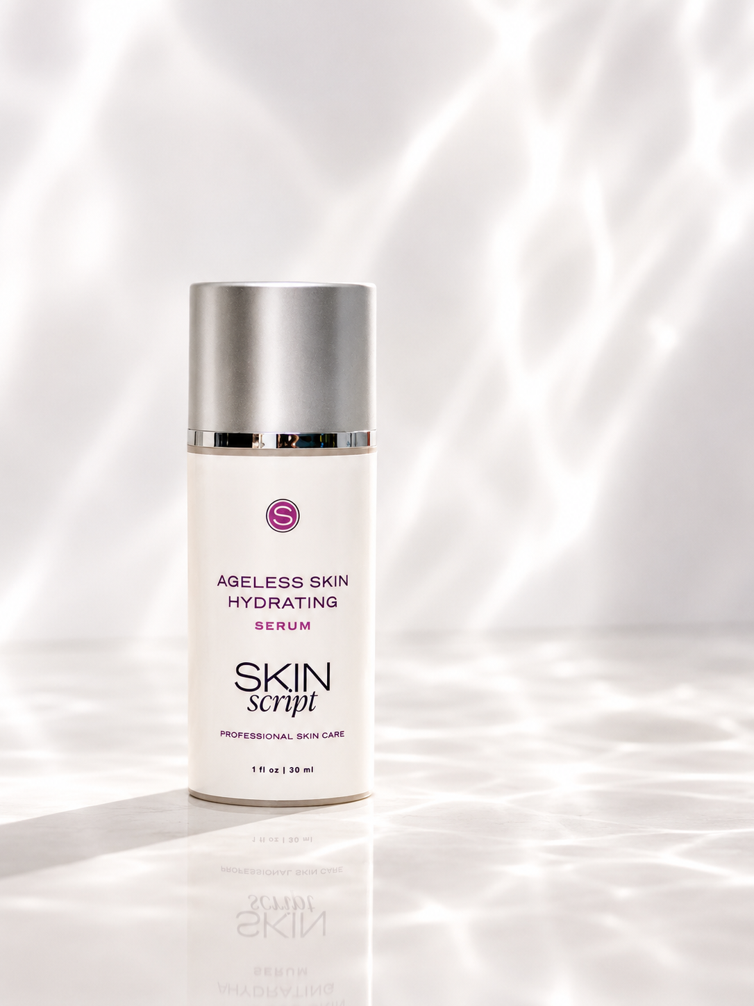 Skincare serum bottle labeled 'Skin Script' ageless hydrating serum on a reflective white surface