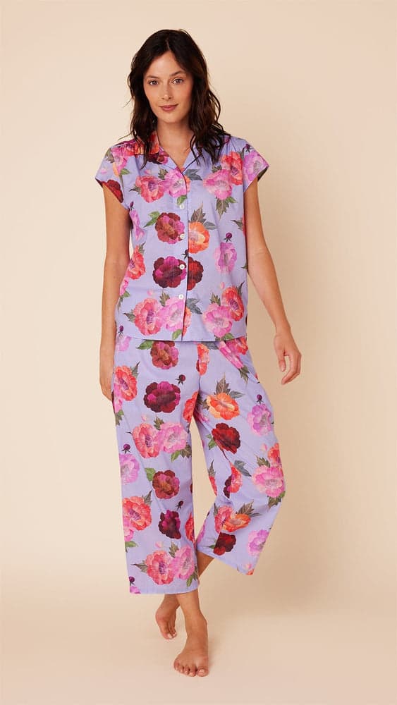 woman wearing the mari cats pajams, focal point on the print 
