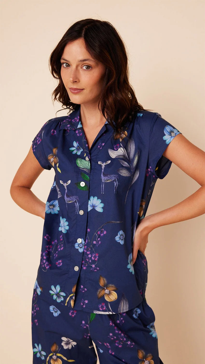 woman wearing the cat's pajamas deerly print with cap sleeves and capri pants 