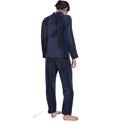 model wearing the lunya washable silk long sleeve pant set in deep blue available at heaven on earth 